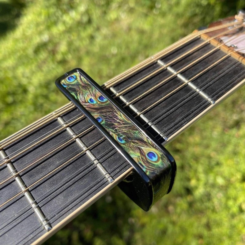 Thalia Capo Black Chrome with Pearl Peacock Feathers Inlay